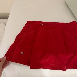 LULULEMON red pace rival skirt.